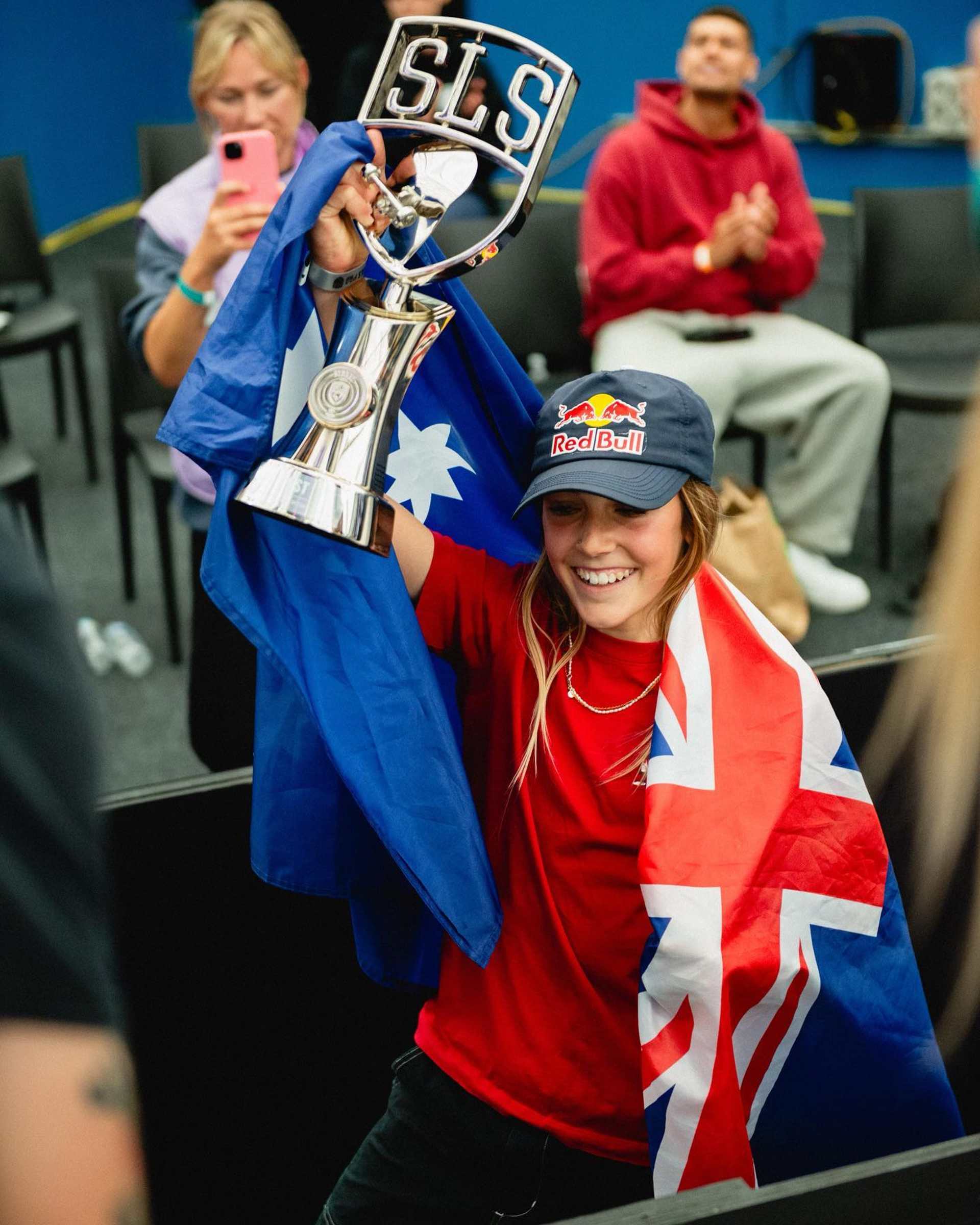 QAS supported skateboarder Chloe Covell with her trophy after winning the Women's SLS Final in Sydney. Photo: Street League Skateboarding.