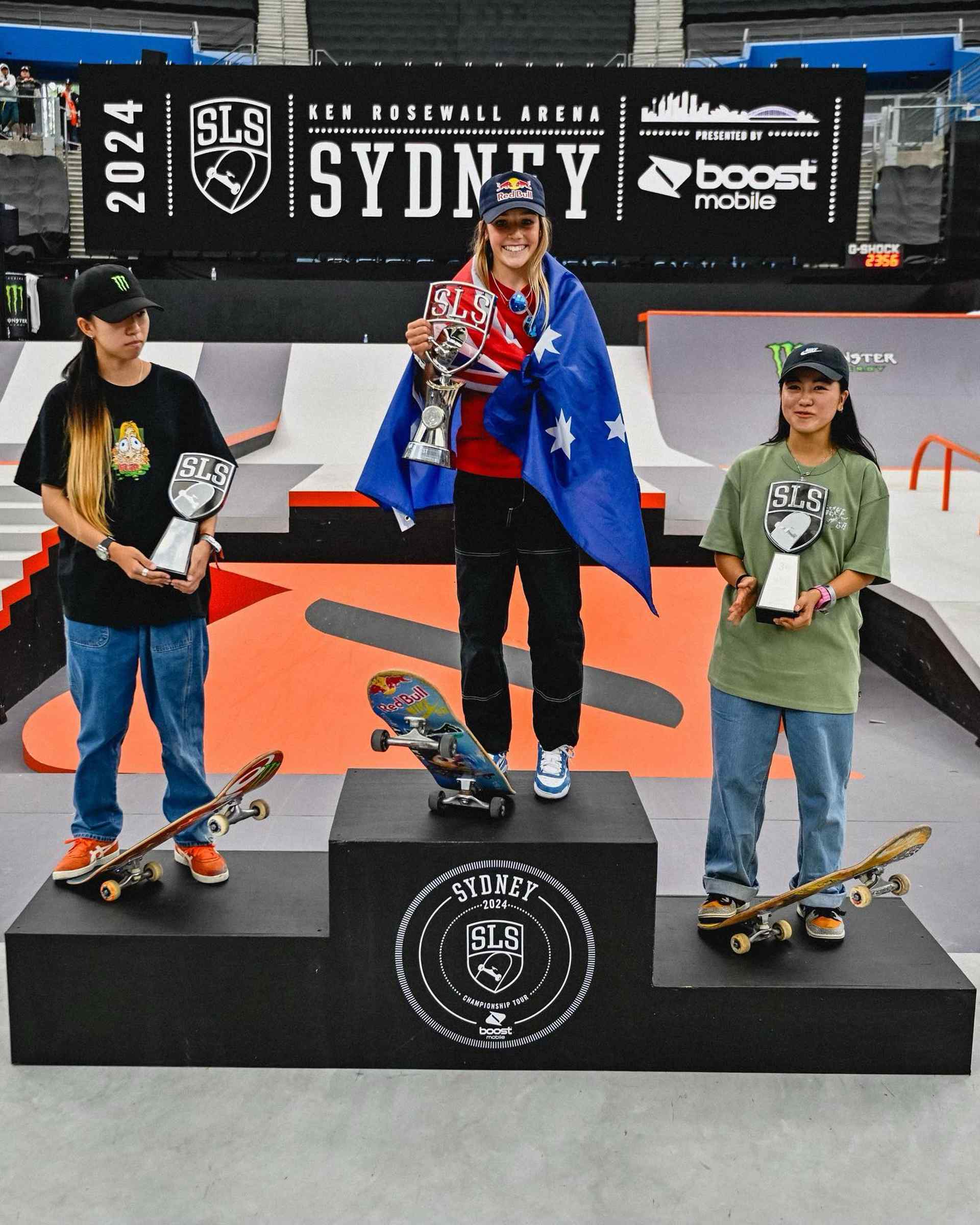 QAS supported street skateboarder, Chloe Covell, on top of the podium after winning the SLS Women's Final in Sydney. Photo: Street League Skateboarding.