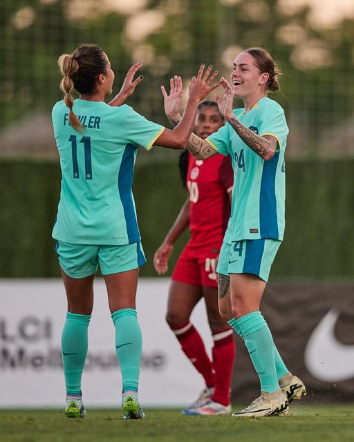 QAS-supported Sharn Freier scores the Matilda's only goal against Canada.