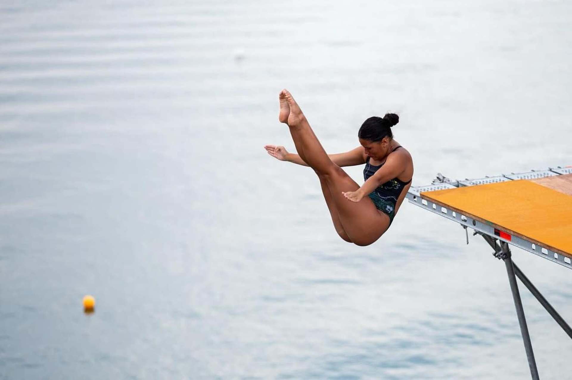 QAS supported high diver Lacey Hema wins the World Aquatics Junior World High Diving Championships in Brazil. Photo: World Aquatics.